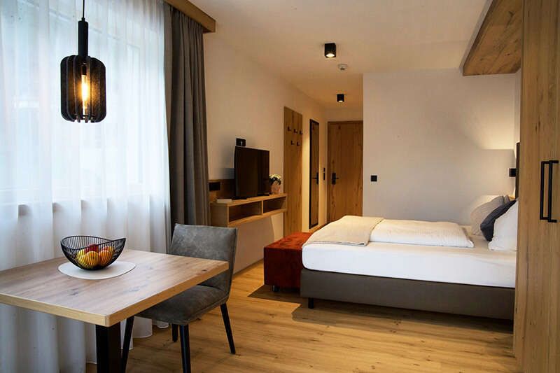 Double bed and seating area