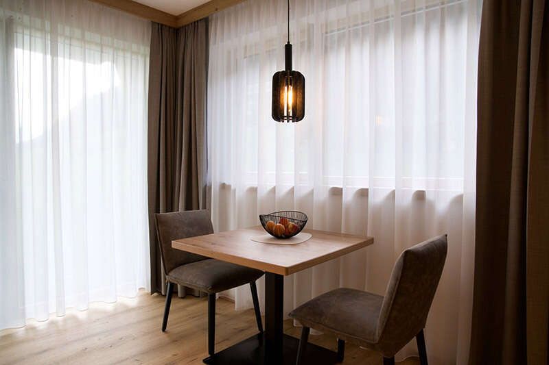 Seating area with a table and two chairs